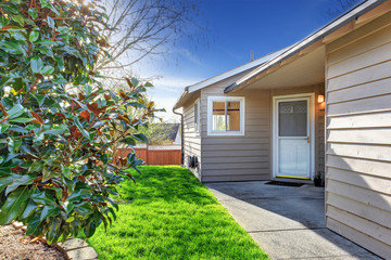 Simple house exterior. Entrance view
