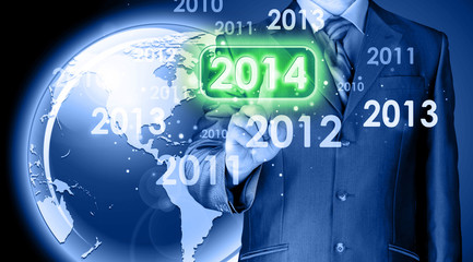 Businessman touching new year 2014