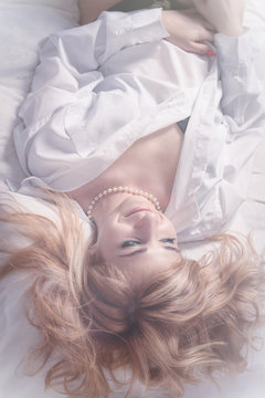 beautiful romantic woman in morning bed