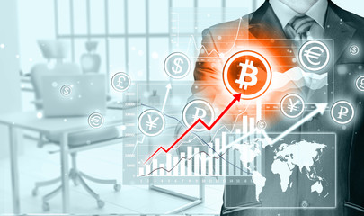 Choosing bitcoins, businessman pressing touch screen button.