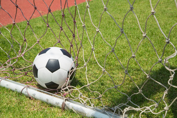 Soccer ball in the goal after shooted