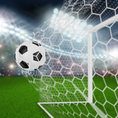 soccer ball in goal net