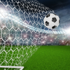 soccer ball in goal net