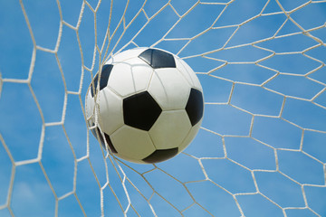 Soccer ball in the goal after shooted