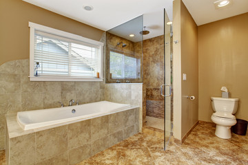 Modern bathroom interior with glass door shower