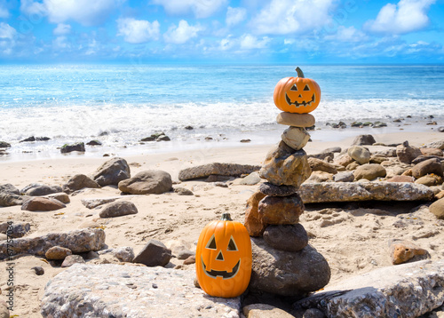 Halloween pumpkins on the beach