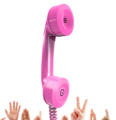pink phone, hands in the background