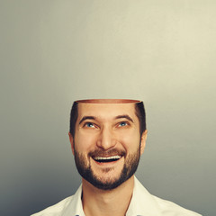 happy businessman looking up