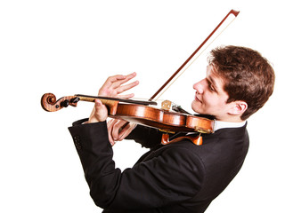 Man violinist playing violin. Classical music art