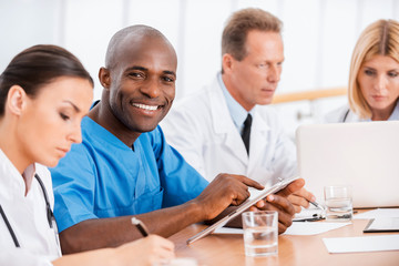 Obraz premium Cheerful doctor at the meeting.