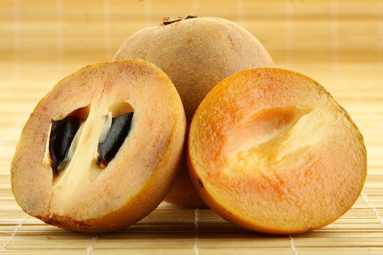 Sapodilla plum, (Manilkara zapota (L.) P. Royen).