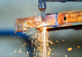 worker adjest acetylene torch