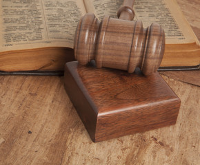 Wooden gavel and books