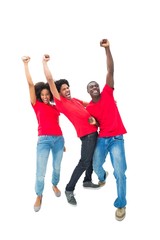 Fototapeta premium Excited football fans in red cheering
