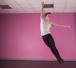 Focused male ballet dancer leaping up © WavebreakMediaMicro