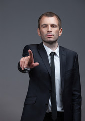 Portrait of white collar pointing finger gestures