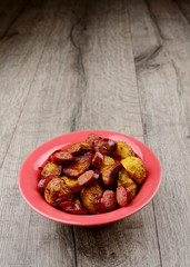 New roasted baked potatoe in the bowl