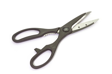 Close - up black metal scissor on white background
