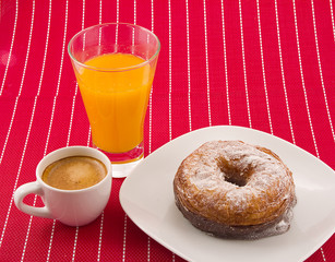 Cronut, coffee and orange juice