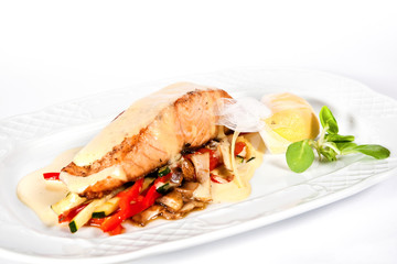 Baked sea bass fillet with vegetables