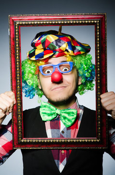 Funny clown with picture frame