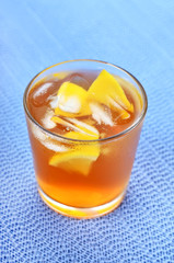 Glass of ice tea with lemon
