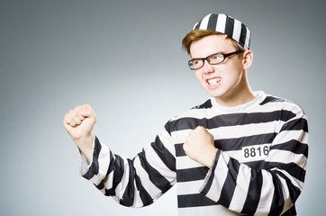Funny prison inmate in concept