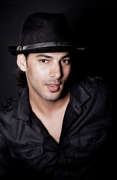 Portrait of young elegant man in the black shirt