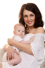 The happy mother with baby on white background