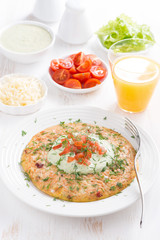 healthy breakfast - omelette with carrots, tomatoes
