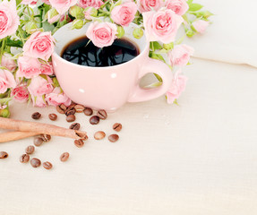 Cup of black coffee and red rose.