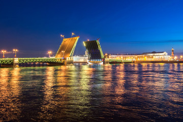 Fototapeta na wymiar Palace bridge raised in summer white nights, St. Petersburg