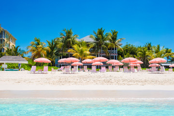 Paradise view of tropical empty sandy beach umbrella