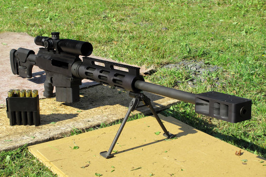 Sniper rifle caliber .50 BMG with muzzle brake.