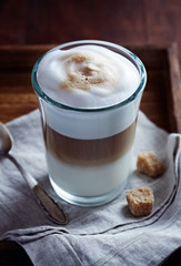 Glass of Latte Macchiato with Brown Sugar