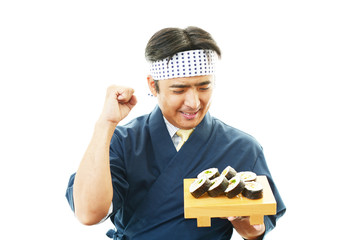 ガッツポーズの寿司職人