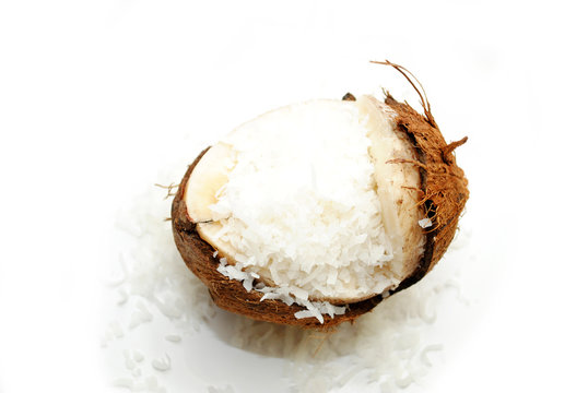 Broken Coconut with Shredded Coconut Spilling Out