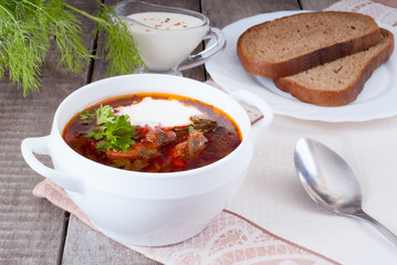 Borsch, soup from a beet, meat and cabbage with tomato sauce