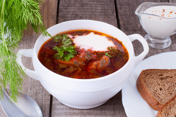Borsch, soup from a beet, meat and cabbage with tomato sauce