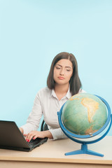 Fototapeta premium Business woman with the globe