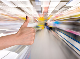 Woman hand with thumb up