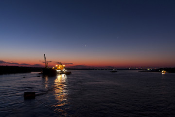 Fototapeta premium Cargo ship at anchor on mississippi river