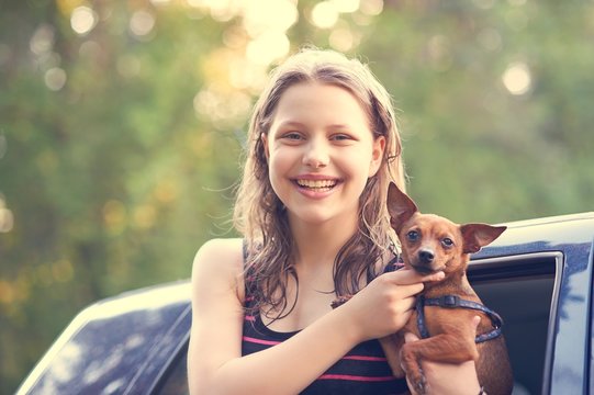 Teen Girl With Her Puppy