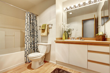 Soft creamy bathroom interior