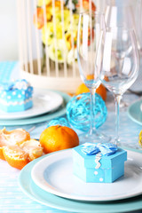 Table serving with colorful tableware close-up