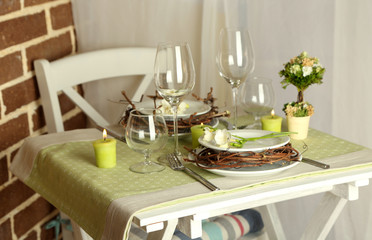 Beautiful holiday Easter table setting in green tones,