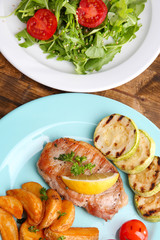 Grilled steak, grilled vegetables and fresh green salad