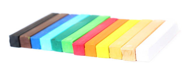 Colorful chalk pastels isolated on white