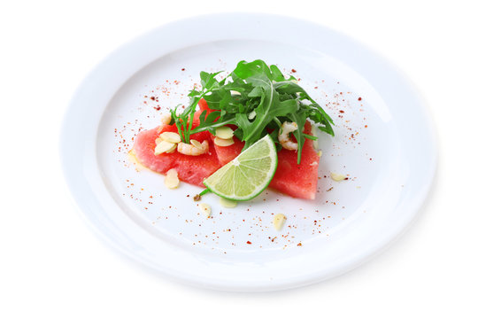 Salad with watermelon, feta, arugula, shrimps, balsamic sauce