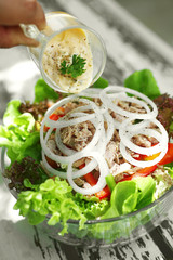 close up tuna salad in glass bowl